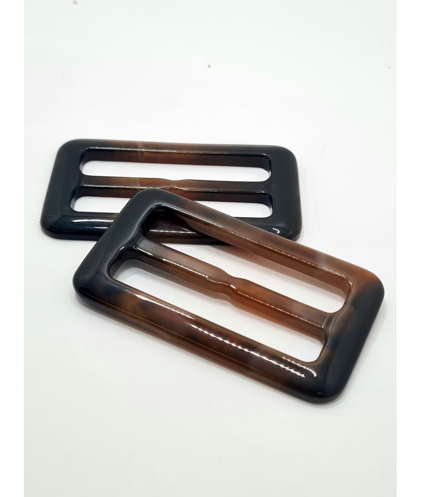 PASACORREA DOBLE PLASTICO 58MM MARRON