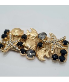 ADORNO PEDRERIA MARINO PECES ESTRELLA MAR ORO / NEGRO (2 UNIDADES)