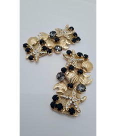ADORNO PEDRERIA MARINO PECES ESTRELLA MAR ORO / NEGRO (2 UNIDADES)