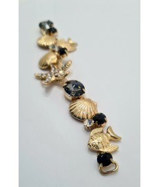 ADORNO STRASS ALARGADO MARINO PECES ESTRELLA MAR ORO / NEGRO (2 UNIDADES)