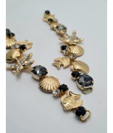 ADORNO STRASS ALARGADO MARINO PECES ESTRELLA MAR ORO / NEGRO (2 UNIDADES)